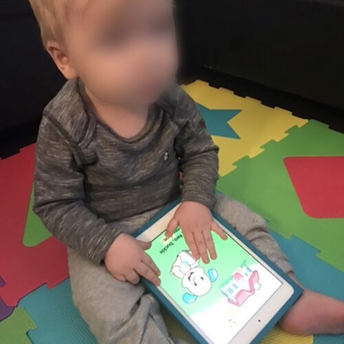 Toddler with iPad